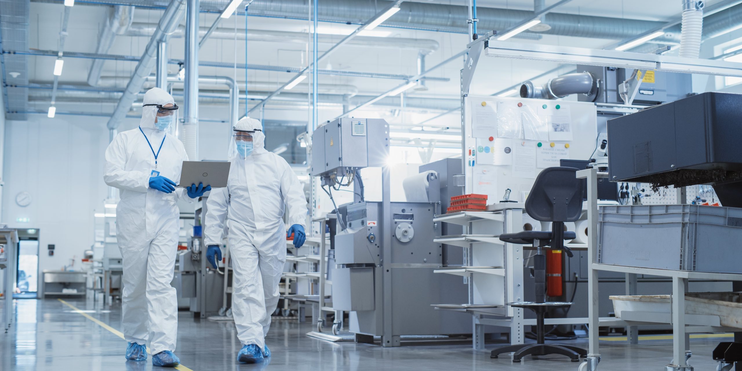 Two scientists in ambient monitoring clean room warehouse