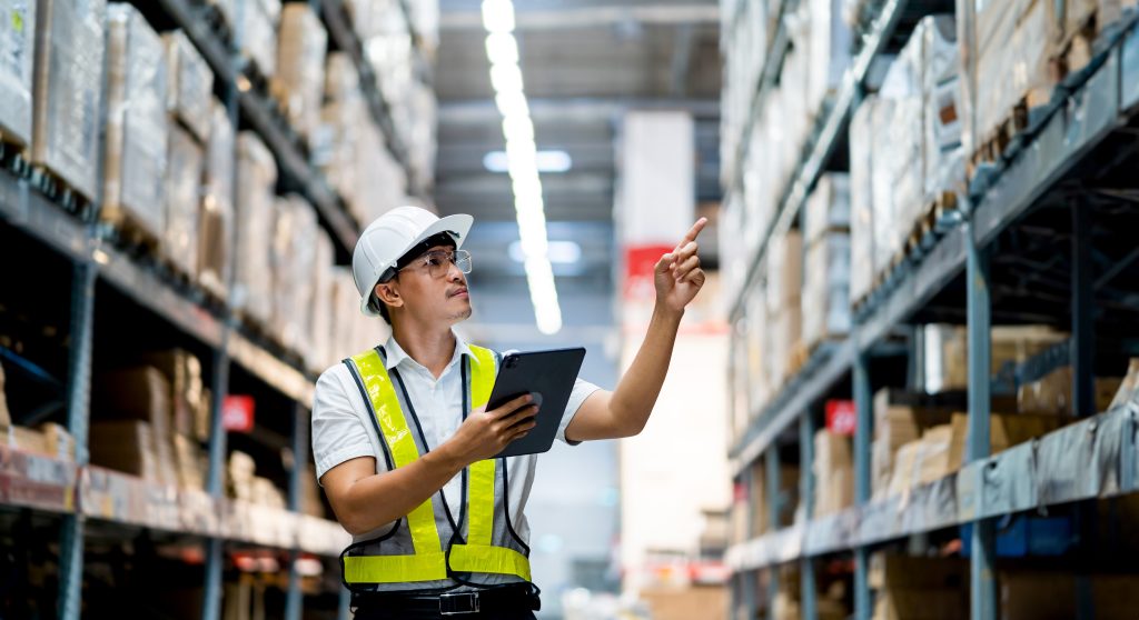 Warehouse worker viewing environmental monitoring data in real time